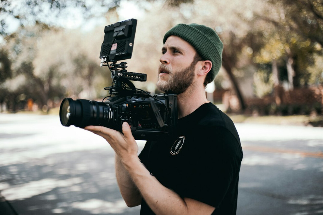 filmmaker reviewing footage