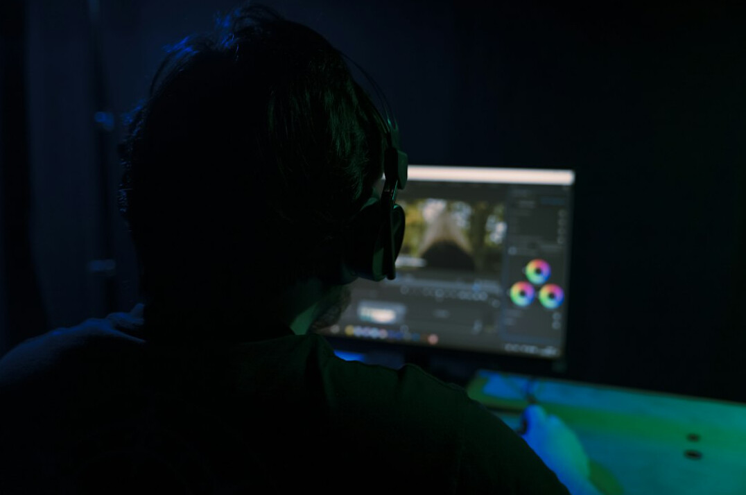 video editor working on computer